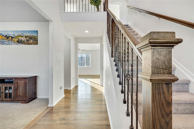 interior space with hardwood / wood-style flooring and ceiling fan