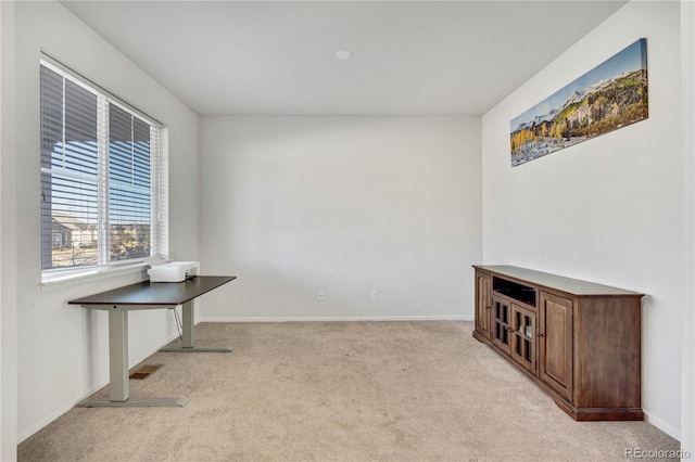 interior space featuring light colored carpet