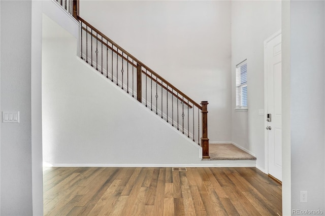 entryway with wood-type flooring