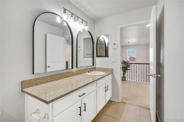 bathroom with vanity and tile patterned floors