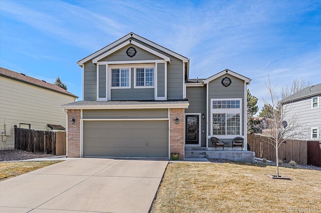 traditional home with concrete driveway, brick siding, fence, and an attached garage