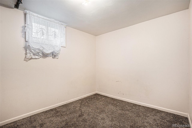 547 S 3rd Ave, Brighton, CO 80601 - carpeted empty room with baseboards