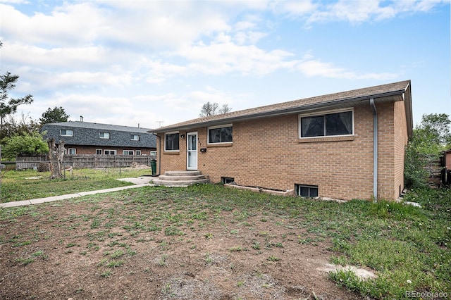 547 S 3rd Ave, Brighton, CO 80601 - ranch-style house featuring fence and brick siding