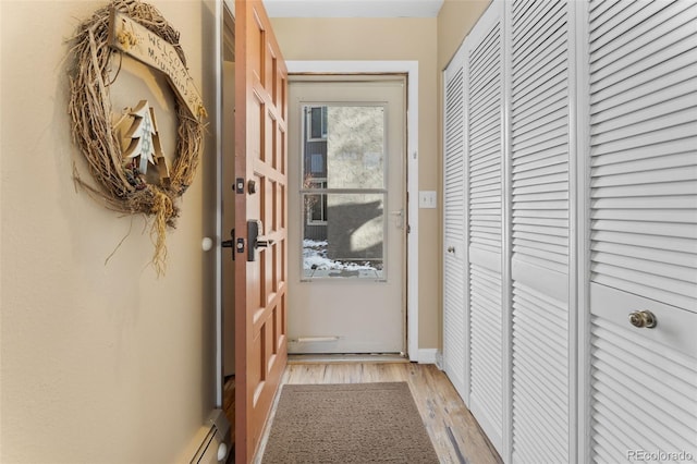 doorway featuring light hardwood / wood-style floors