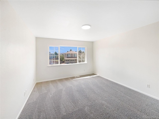 18951 E 43rd Ave, Denver, CO 80249 - spare room with carpet floors and baseboards