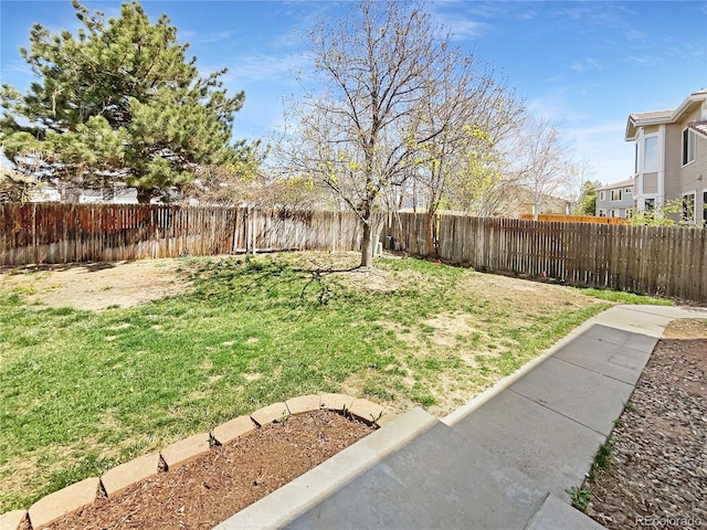 18951 E 43rd Ave, Denver, CO 80249 - view of yard featuring a fenced backyard