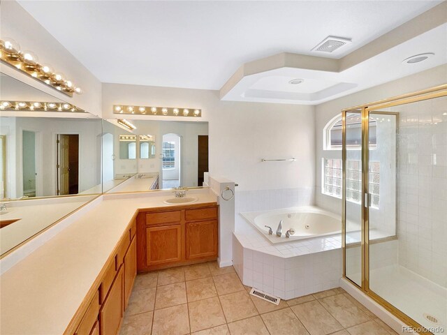18951 E 43rd Ave, Denver, CO 80249 - full bathroom featuring a shower stall, a bath, tile patterned flooring, and visible vents