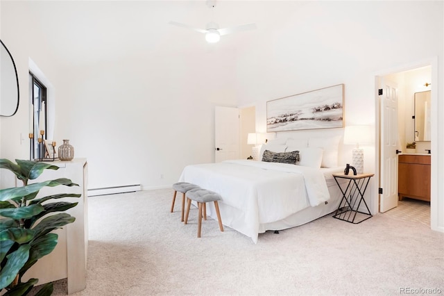 carpeted bedroom featuring a high ceiling, ensuite bath, ceiling fan, and a baseboard radiator