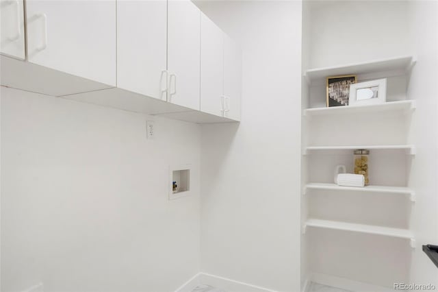 washroom featuring cabinets and hookup for a washing machine