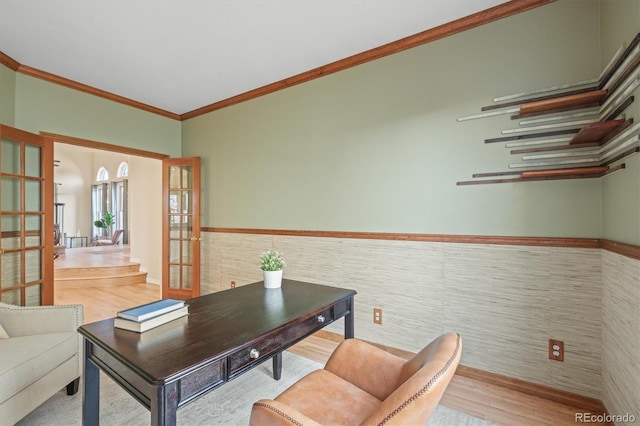 office area featuring crown molding, wood finished floors, wainscoting, tile walls, and french doors