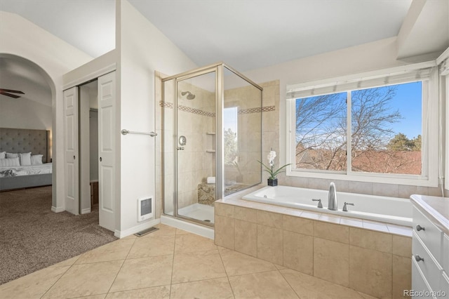 full bathroom with visible vents, tile patterned flooring, ensuite bath, a stall shower, and a garden tub