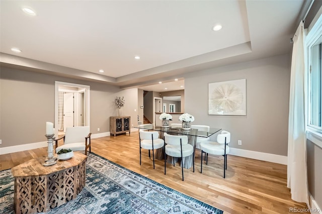 2692 N Raleigh St, Denver, CO 80212 - dining space featuring light wood-type flooring, recessed lighting, and a raised ceiling