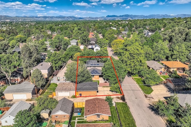 2692 N Raleigh St, Denver, CO 80212 - aerial perspective of suburban area with property boundaries highlighted and a mountainous background