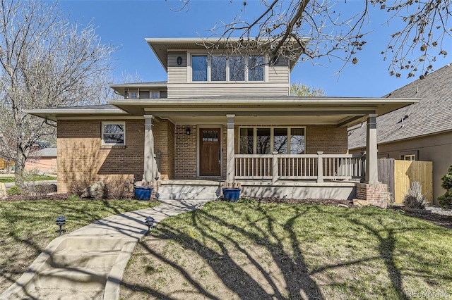 2692 N Raleigh St, Denver, CO 80212 - view of front of property featuring a porch and brick siding
