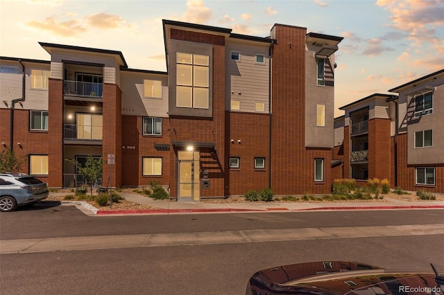 14301 E Tennessee Ave Unit 109, Aurora, CO 80012 - view of property at dusk