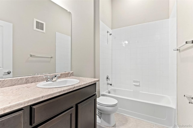 14301 E Tennessee Ave Unit 109, Aurora, CO 80012 - full bathroom featuring vanity, toilet, tub / shower combination, and tile patterned floors
