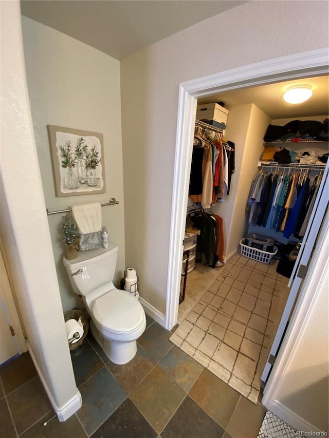 bathroom featuring toilet