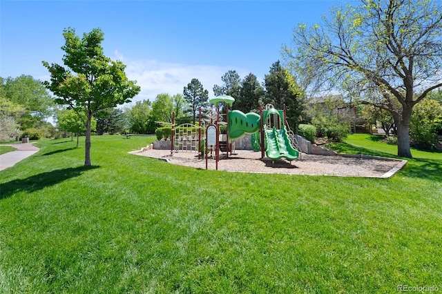 community play area featuring a lawn