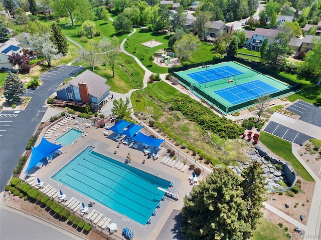 drone / aerial view of a pool