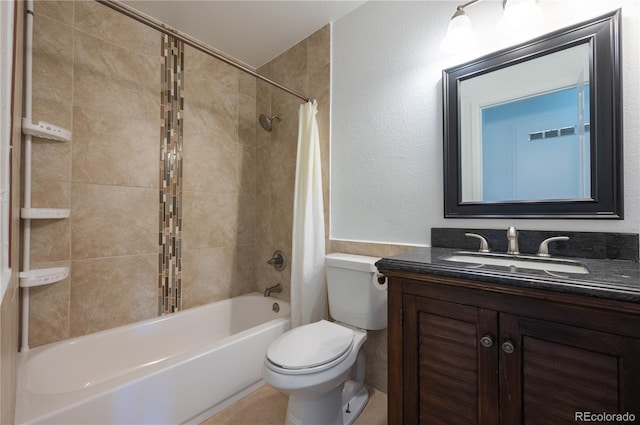 full bathroom featuring toilet, vanity, and shower / bath combo