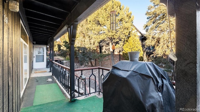 view of patio / terrace featuring area for grilling and a balcony