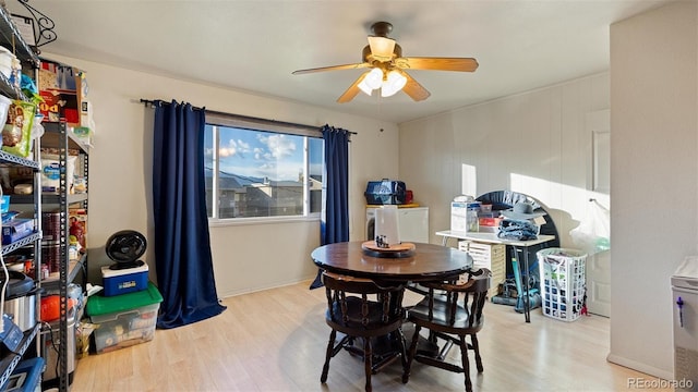 dining room featuring ceiling fan and light wood-type flooring