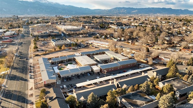 drone / aerial view featuring a mountain view