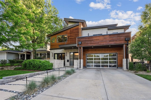 445 Forest St, Denver, CO 80220 - contemporary house with driveway and a garage