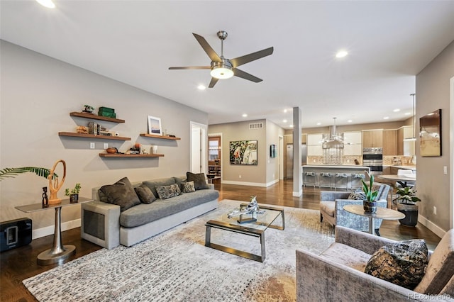 445 Forest St, Denver, CO 80220 - living room featuring wood finished floors, ceiling fan, and recessed lighting