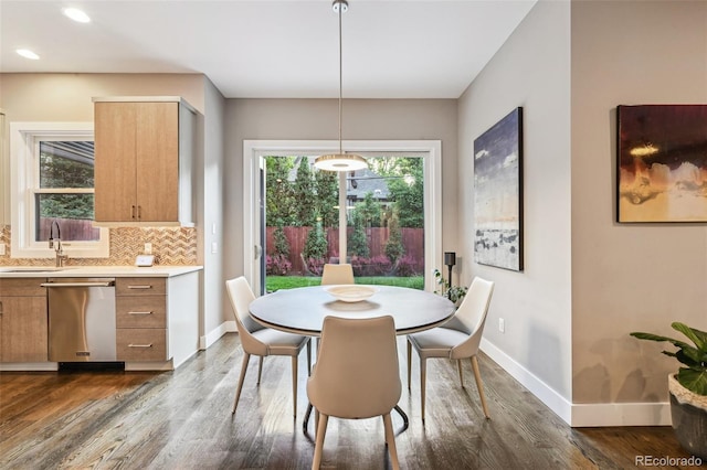 445 Forest St, Denver, CO 80220 - dining space with dark wood-type flooring and recessed lighting