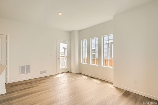 15228 Detroit St, Thornton, CO 80602 - spare room featuring light wood-style floors and recessed lighting