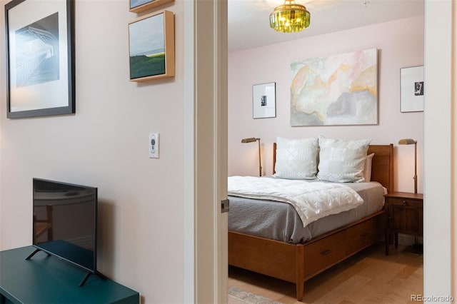 bedroom with light wood-style flooring