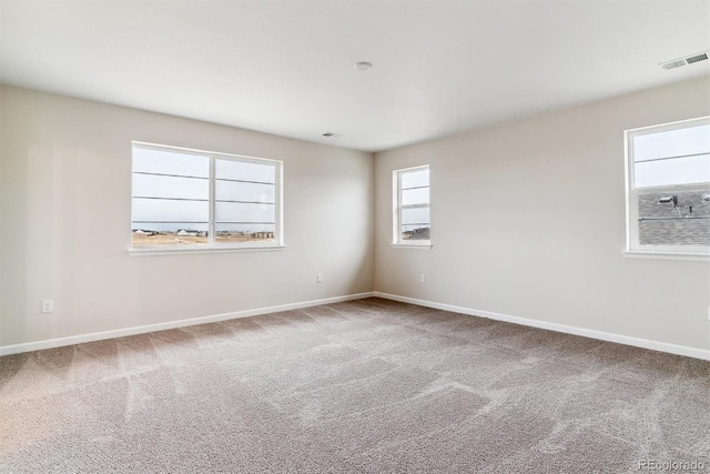 view of carpeted spare room