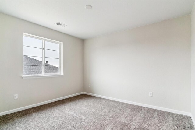 unfurnished room featuring carpet floors