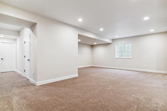 basement featuring carpet flooring