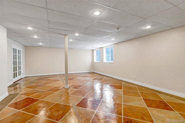 6633 E 166th Pl, Brighton, CO 80602 - below grade area featuring tile patterned flooring, baseboards, recessed lighting, and a drop ceiling