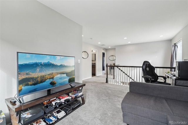 carpeted living room with recessed lighting