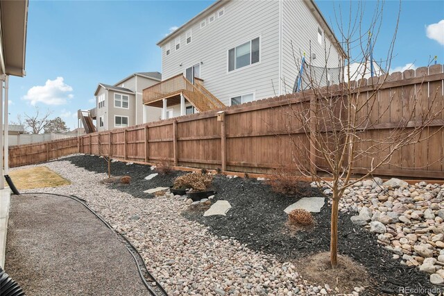 view of yard with a fenced backyard