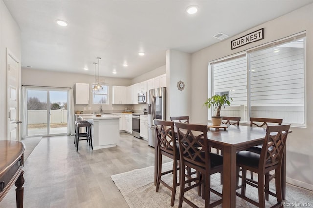 362 Bozeman Trl, Ault, CO 80610 - dining room with recessed lighting and light wood-style floors