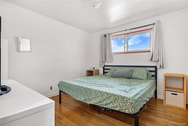 bedroom featuring hardwood / wood-style flooring