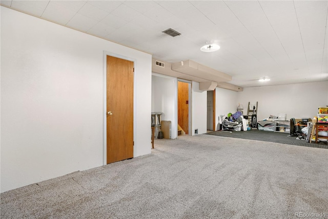 basement with carpet flooring