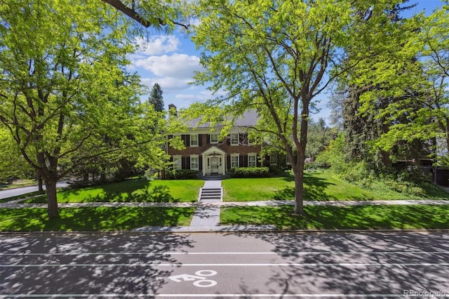 2222 E 7th Avenue Parkway, Denver, CO 80206 - colonial house featuring a front yard