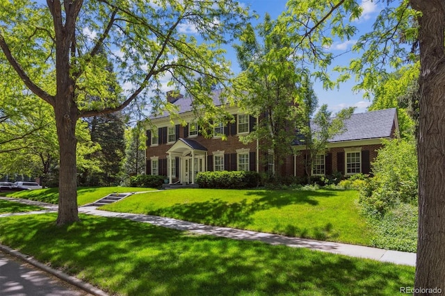 2222 E 7th Avenue Parkway, Denver, CO 80206 - colonial house with a front yard and brick siding