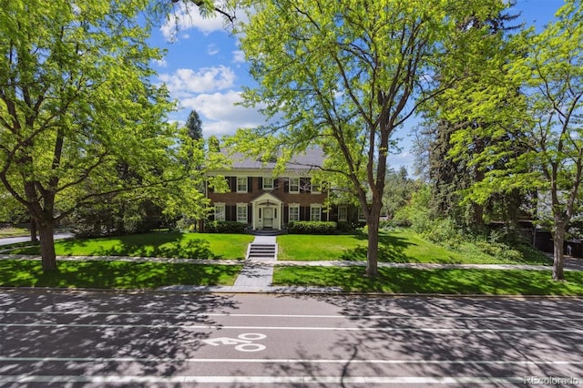 2222 E 7th Avenue Parkway, Denver, CO 80206 - colonial-style house featuring a front yard