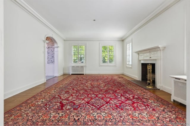 2222 E 7th Avenue Parkway, Denver, CO 80206 - unfurnished living room featuring ornamental molding, wood finished floors, baseboards, and a fireplace with raised hearth