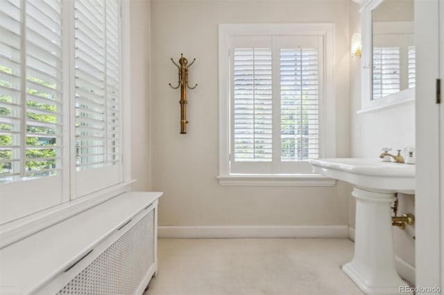2222 E 7th Avenue Parkway, Denver, CO 80206 - bathroom with radiator and baseboards