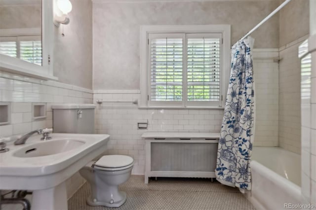 2222 E 7th Avenue Parkway, Denver, CO 80206 - bathroom featuring shower / bathtub combination with curtain, healthy amount of natural light, tile patterned flooring, and tile walls