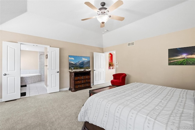 bedroom featuring a ceiling fan, carpet, visible vents, baseboards, and vaulted ceiling