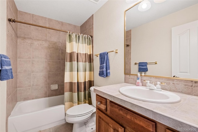 bathroom featuring vanity, toilet, and shower / bathtub combination with curtain