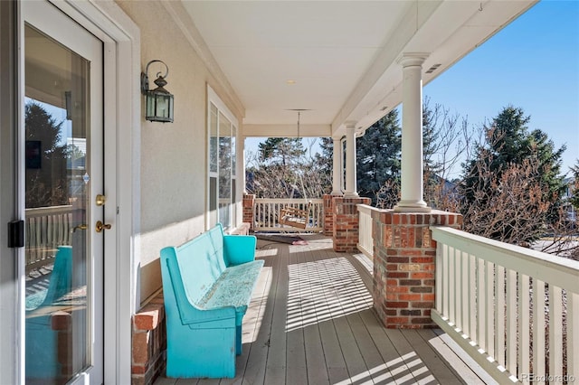 wooden deck with a porch